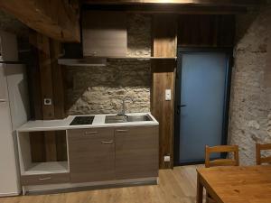 Køkken eller tekøkken på Le domaine des mortiers appartement T2