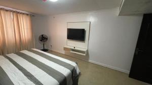TV a/nebo společenská místnost v ubytování D Swift apartments