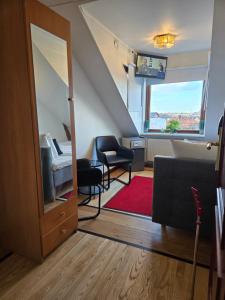 Khu vực ghế ngồi tại Stockholm Penthouse Hotel-Adults only
