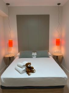 En eller flere senge i et værelse på Osito Hub - Florista + 17 billeder