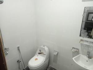 Ένα μπάνιο στο CH Rayzm Family Guest house