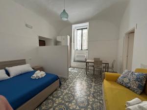 Una cama o camas en una habitación de La casetta mare e monti