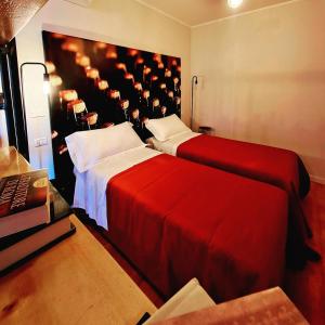 Postel nebo postele na pokoji v ubytování Agriturismo Violati
