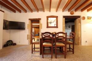 A television and/or entertainment centre at House Walking Distance to Pollensa by Renthousing