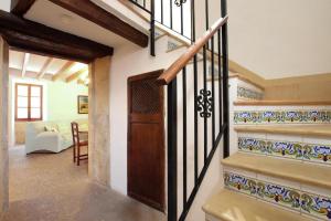 A bed or beds in a room at House Walking Distance to Pollensa by Renthousing