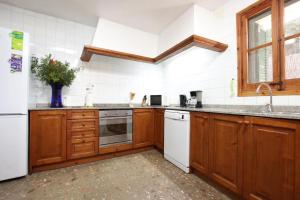 A kitchen or kitchenette at House Walking Distance to Pollensa by Renthousing