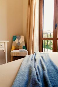 Postel nebo postele na pokoji v ubytování Agriturismo Violati