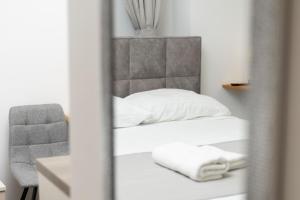 Voodi või voodid majutusasutuse Split Varos Inn toas