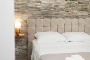 Voodi või voodid majutusasutuse Split Varos Inn toas