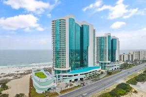 an aerial view of a building on the beach at Turquoise D1306 in Orange Beach