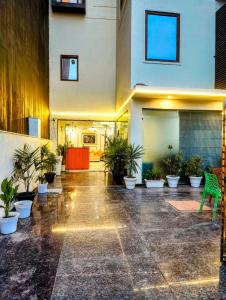 Hotel Mavens House Artemis Hospital Road外面的花园