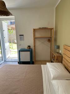 Rúm í herbergi á Cilento rooms