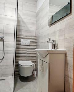 Koupelna v ubytování Apartments Ćurić