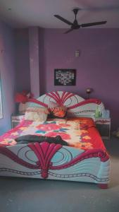 Postel nebo postele na pokoji v ubytování Sameer homestay