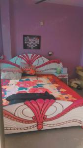 Postel nebo postele na pokoji v ubytování Sameer homestay