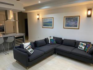 Posezení v ubytování Apt 4 The Grove Residences