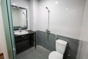 Ein Badezimmer in der Unterkunft 5.T Hostel