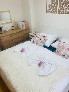 Postel nebo postele na pokoji v ubytování Labela Luhačovice Apartment