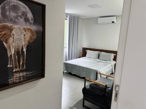 Postel nebo postele na pokoji v ubytování AR Pousada