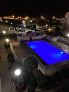 Bazén v ubytování Pavillon les Jardins de la Plage nebo v jeho okolí