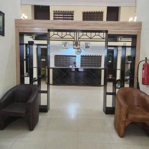 Uma área de estar em EcoSignature ABK Hotel, Ibadan