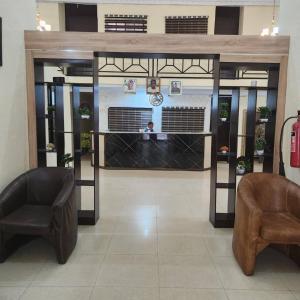 Uma área de estar em EcoSignature ABK Hotel, Ibadan