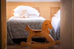 Postel nebo postele na pokoji v ubytování Hôtel Le Pré Galoffre