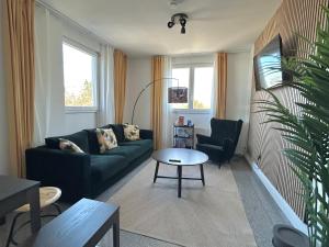 Χώρος καθιστικού στο LTA Apartment München Süd No3 Friends & Family