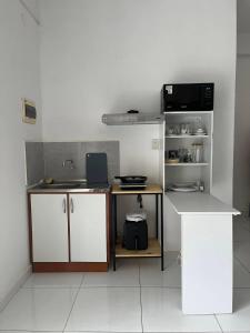 Η κουζίνα ή μικρή κουζίνα στο Alicia House