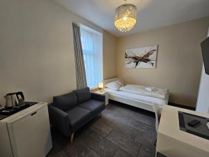 Voodi või voodid majutusasutuse Hotel Surselva toas