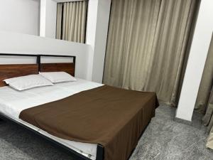 Ένα ή περισσότερα κρεβάτια σε δωμάτιο στο Hotel Comfort Stay