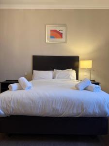 Postel nebo postele na pokoji v ubytování Green Ariana Hotel - near Wembley and central London