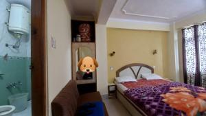 Voodi või voodid majutusasutuse Hotel Harbans toas