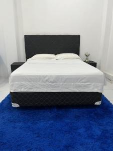 Ένα ή περισσότερα κρεβάτια σε δωμάτιο στο Alicia House