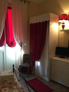TV a/nebo společenská místnost v ubytování B&B Casa Celsi