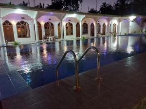 The swimming pool at or close to MRD Beach Hotel