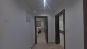 Letto o letti in una camera di The Alexandra Apartments, Wuse II