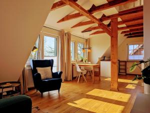 Posezení v ubytování Gemütliche Wohnung an der Nordseeküste in Utgast