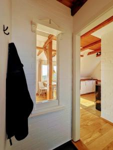 Postel nebo postele na pokoji v ubytování Gemütliche Wohnung an der Nordseeküste in Utgast