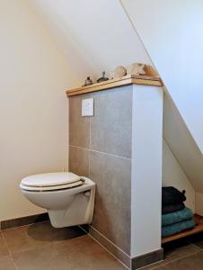 Koupelna v ubytování Gemütliche Wohnung an der Nordseeküste in Utgast