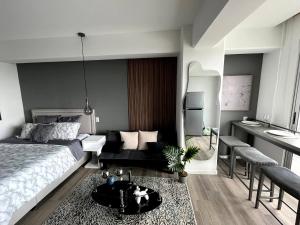 Ένα ή περισσότερα κρεβάτια σε δωμάτιο στο Apartamentos CAICHAN