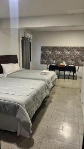 Кровать или кровати в номере Hotel Herrera