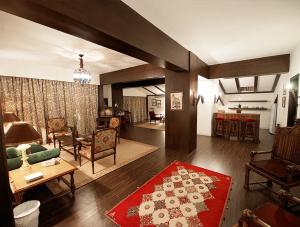 a living room with a couch and a table at Printania Palace Hotel in Broummana +45 photos