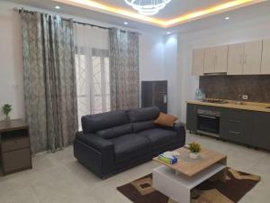 Una cocina o zona de cocina en CHEZ CODOU FANN - POINT E