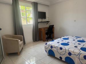 Katil atau katil-katil dalam bilik di Maison Mimosa