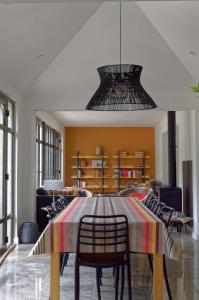 a dining room with a table and chairs at Maison de campagne Proche de St Emilion in Montcaret