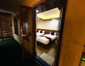 Letto o letti in una camera di Lazimpat Boutique Hotel