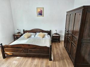 Postel nebo postele na pokoji v ubytování Apartments Plejic