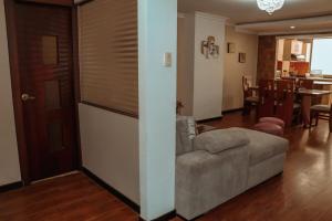 Posezení v ubytování Acojedor Apartamento en Loja + 7 fotografií