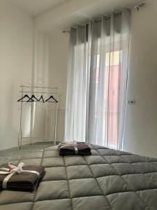 Postel nebo postele na pokoji v ubytování La Casetta Adua